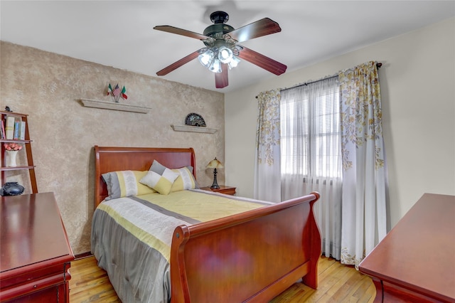 13042 NW 59th Ave, Flushing, NY 11355 - bedroom featuring a ceiling fan and hardwood / wood-style flooring