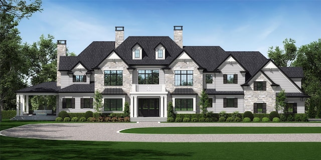 2 E Gate Rd, Lloyd Harbor, NY 11743 - view of front of property featuring a front yard, a chimney, and stone siding