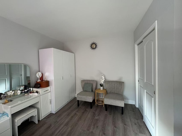 living area featuring dark wood finished floors