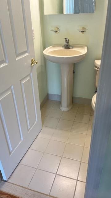 40 Jefferson Oval Unit A, Yorktown Heights, NY 10598 - half bath with tile patterned flooring, baseboards, and toilet