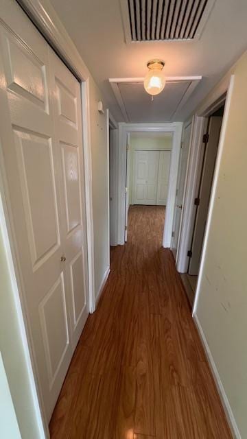 40 Jefferson Oval Unit A, Yorktown Heights, NY 10598 - hallway featuring attic access, wood finished floors, and baseboards
