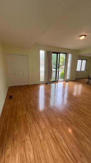 40 Jefferson Oval Unit A, Yorktown Heights, NY 10598 - unfurnished living room featuring light wood-style floors and baseboards