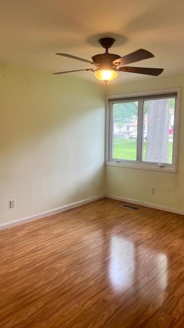40 Jefferson Oval Unit A, Yorktown Heights, NY 10598 - empty room featuring wood finished floors, baseboards, and ceiling fan