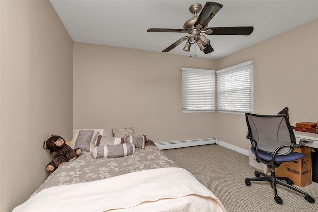 carpeted bedroom with a baseboard radiator, baseboards, and ceiling fan