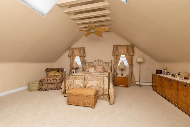 bedroom featuring a baseboard heating unit, vaulted ceiling, and light colored carpet