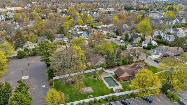 birds eye view of property with a residential view