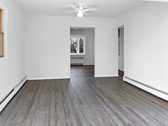 empty room featuring radiator heating unit, ceiling fan, wood finished floors, and a baseboard heating unit