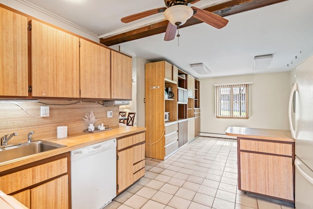 kitchen featuring a baseboard heating unit, a sink, tasteful backsplash, white appliances, and light countertops