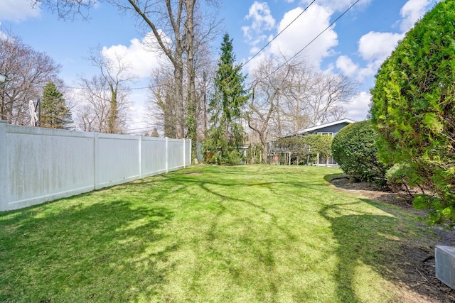 view of yard with fence