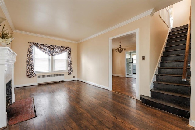 unfurnished living room featuring radiator heating unit, stairs, a chandelier, wood-type flooring, and ornamental molding