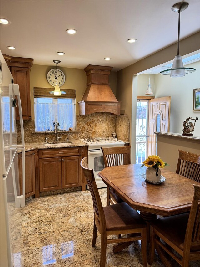 dining area featuring recessed lighting