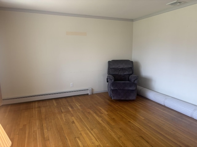 60 Hewitt Blvd, Center Moriches, NY 11934 - unfurnished room with a baseboard radiator, visible vents, crown molding, and wood-type flooring