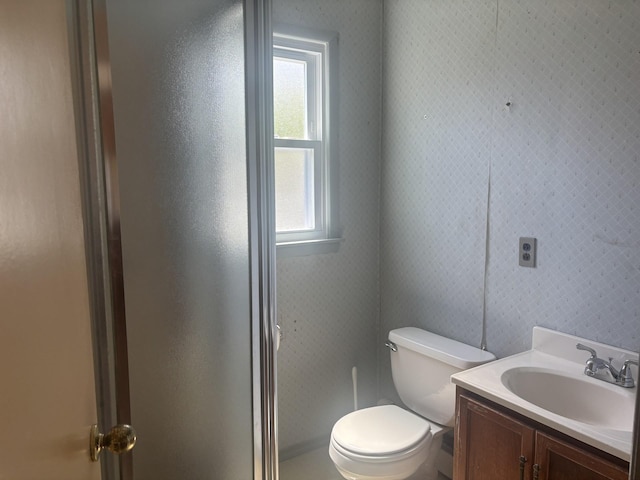 60 Hewitt Blvd, Center Moriches, NY 11934 - full bathroom featuring a stall shower, toilet, and vanity