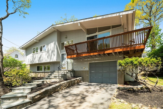 view of front of home featuring driveway and a garage