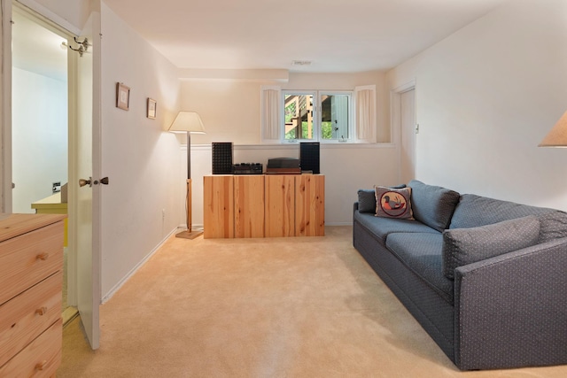 living room featuring light carpet and visible vents