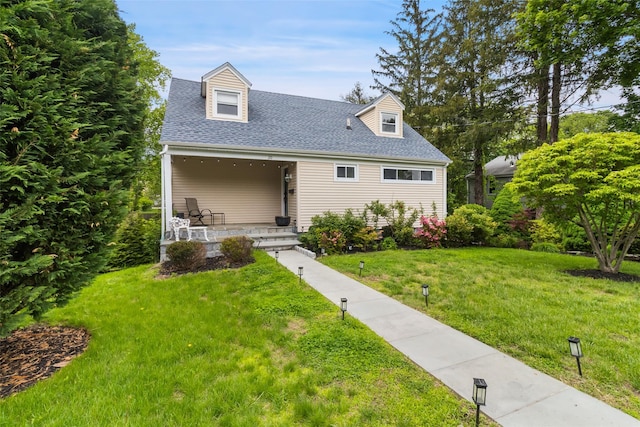 20 Brook St, Mount Kisco, NY 10549 - cape cod house with a front lawn, a shingled roof, and a porch