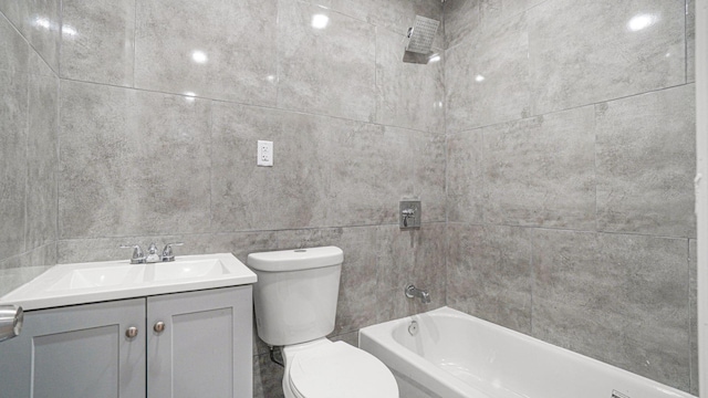 679 E 221st St, Bronx, NY 10467 - full bathroom with toilet, vanity, and shower / washtub combination