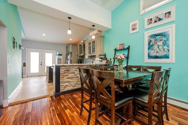 100 California St, Long Beach, NY 11561 - dining room with baseboards, french doors, and wood finished floors