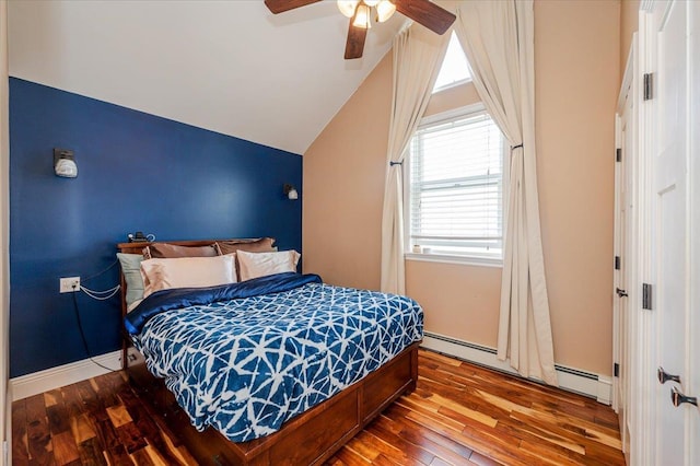 100 California St, Long Beach, NY 11561 - bedroom featuring vaulted ceiling, wood finished floors, a baseboard radiator, and ceiling fan