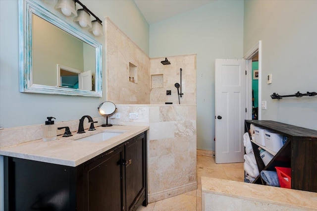 100 California St, Long Beach, NY 11561 - full bath with tile patterned floors, vaulted ceiling, vanity, and a walk in shower