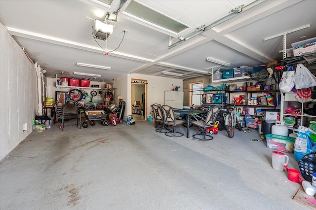 100 California St, Long Beach, NY 11561 - garage featuring a garage door opener