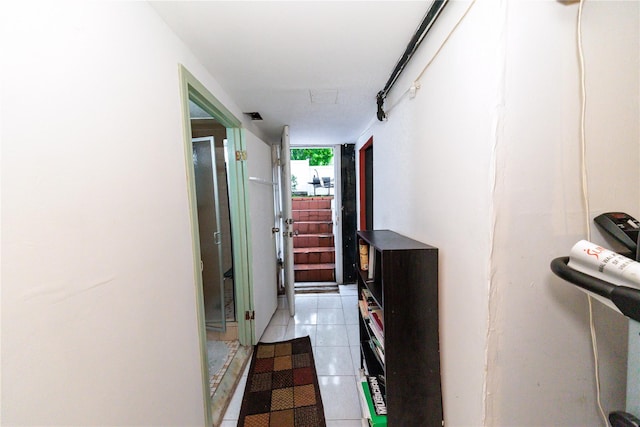 8521 80th St, Woodhaven, NY 11421 - corridor with light tile patterned flooring