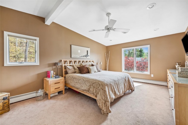 bedroom featuring lofted ceiling with beams, a baseboard heating unit, and light colored carpet