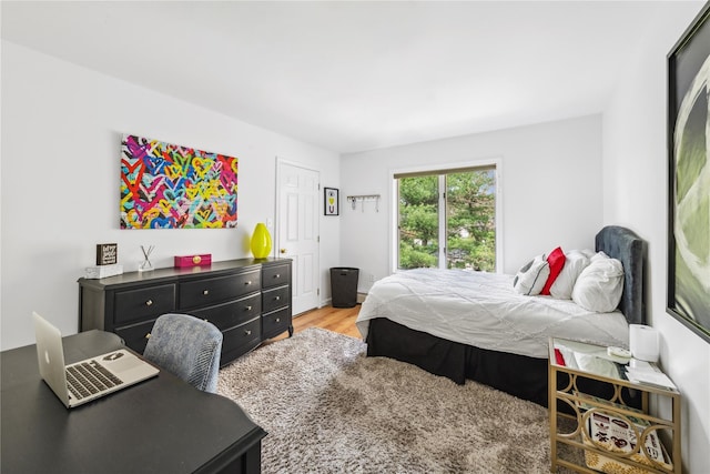 bedroom with light wood-style flooring