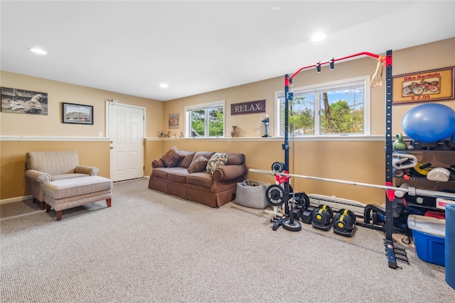 workout room with carpet floors and recessed lighting