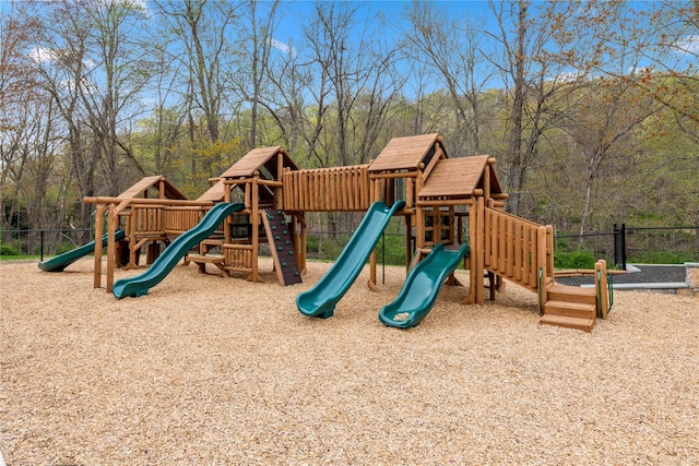 view of playground featuring fence