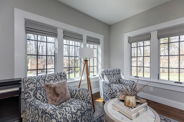 sitting room featuring wood finished floors and baseboards