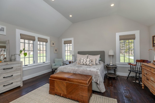 bedroom with vaulted ceiling, multiple windows, dark wood-style flooring, baseboards, and recessed lighting