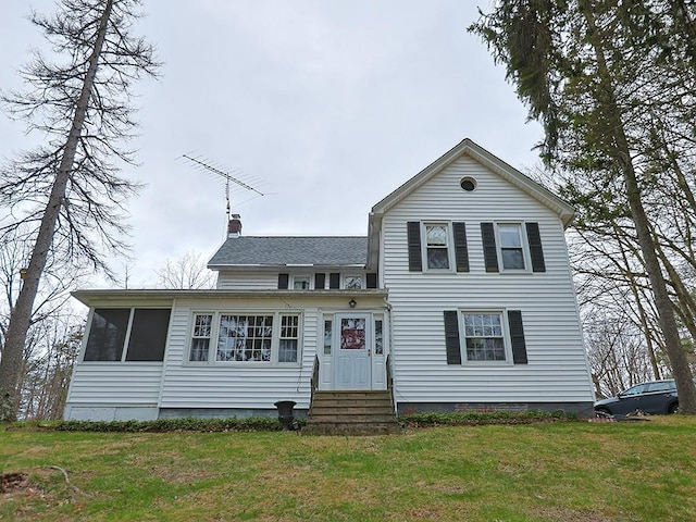 4073 Rte 9w, Saugerties, NY 12477 - traditional-style home featuring a chimney, a shingled roof, entry steps, and a front lawn