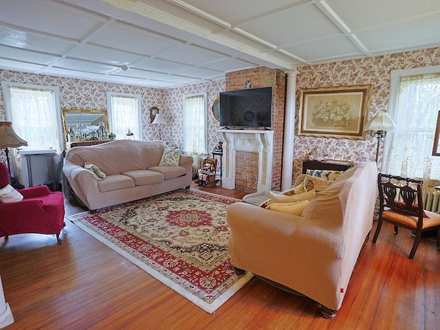 4073 Rte 9w, Saugerties, NY 12477 - living room with wood-type flooring, coffered ceiling, wallpapered walls, and a fireplace