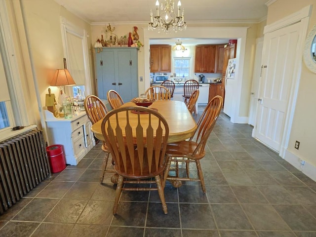 4073 Rte 9w, Saugerties, NY 12477 - dining area with ornamental molding, radiator heating unit, a chandelier, and baseboards