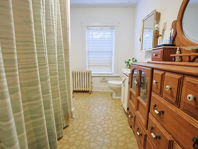 4073 Rte 9w, Saugerties, NY 12477 - full bathroom featuring toilet, vanity, radiator heating unit, and tile patterned floors