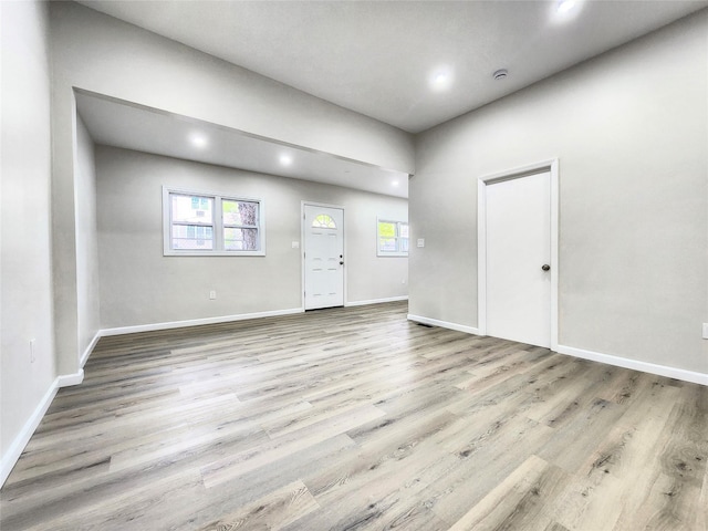 24 Wayne St, Staten Island, NY 10310 - entrance foyer featuring recessed lighting, healthy amount of natural light, wood finished floors, and baseboards