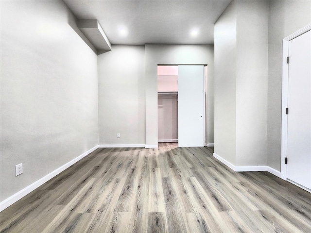 24 Wayne St, Staten Island, NY 10310 - unfurnished bedroom featuring wood finished floors and baseboards