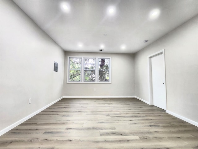 24 Wayne St, Staten Island, NY 10310 - unfurnished room featuring recessed lighting, baseboards, and wood finished floors