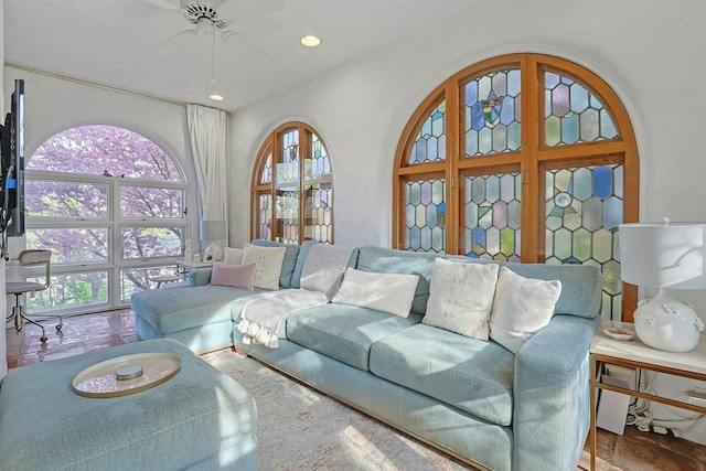 living area featuring ceiling fan, recessed lighting, and a wealth of natural light