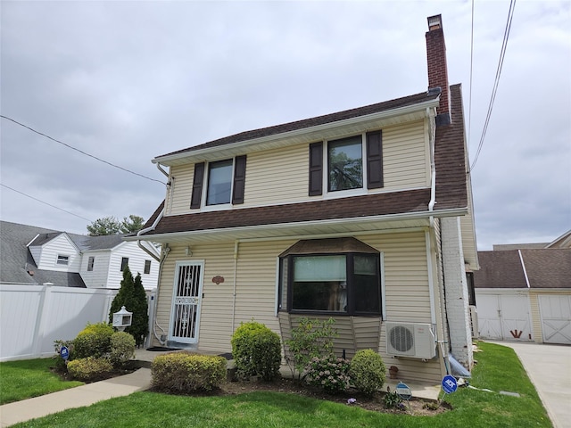 view of front of home with ac unit, fence, and a chimney