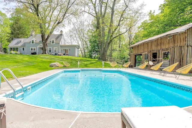 893 Laroe Rd, Monroe, NY 10950 - outdoor pool featuring a yard, a patio, and view of wooded area