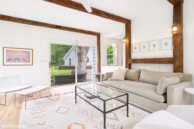 893 Laroe Rd, Monroe, NY 10950 - living room featuring hardwood / wood-style floors, healthy amount of natural light, beamed ceiling, and wood walls