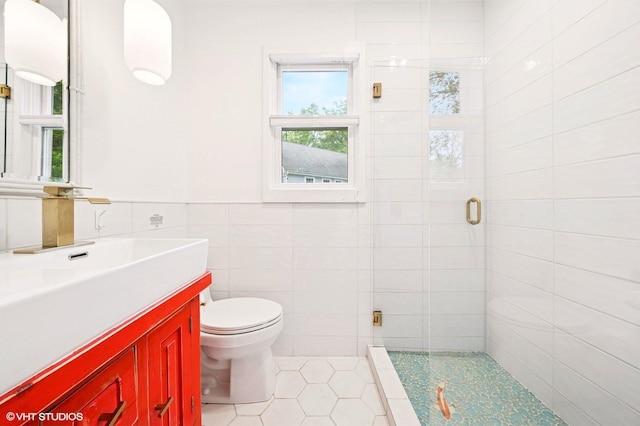 893 Laroe Rd, Monroe, NY 10950 - full bathroom with a stall shower, tile walls, tile patterned floors, toilet, and vanity