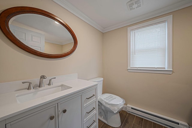 bathroom featuring wood finished floors, visible vents, toilet, vanity, and a baseboard radiator