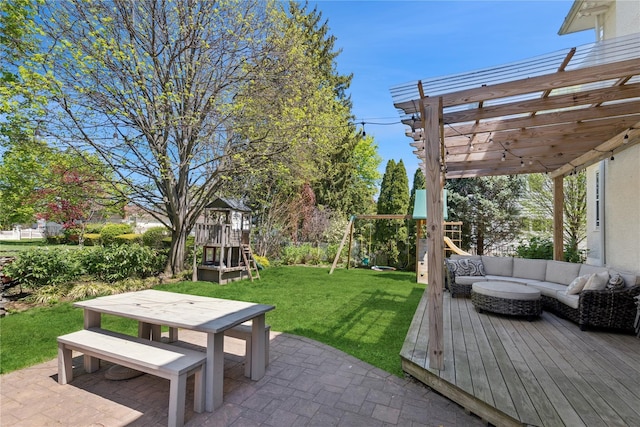 exterior space with outdoor lounge area, a pergola, a deck, a playground, and outdoor dining space