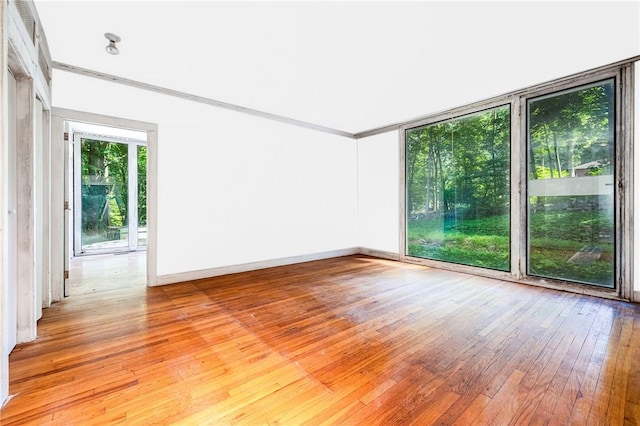 319 Pound Ridge Rd, Bedford, NY 10506 - empty room with light wood-style floors and baseboards