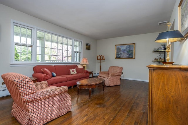 26 Strathmore Dr, New City, NY 10956 - living room featuring wood-type flooring, baseboards, and a baseboard heating unit