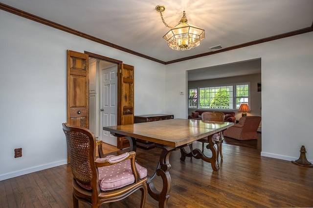 26 Strathmore Dr, New City, NY 10956 - dining area with visible vents, hardwood / wood-style flooring, baseboards, an inviting chandelier, and ornamental molding