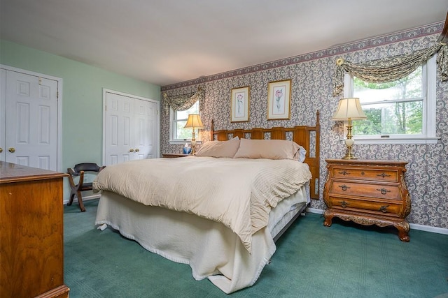 26 Strathmore Dr, New City, NY 10956 - carpeted bedroom with multiple closets and wallpapered walls